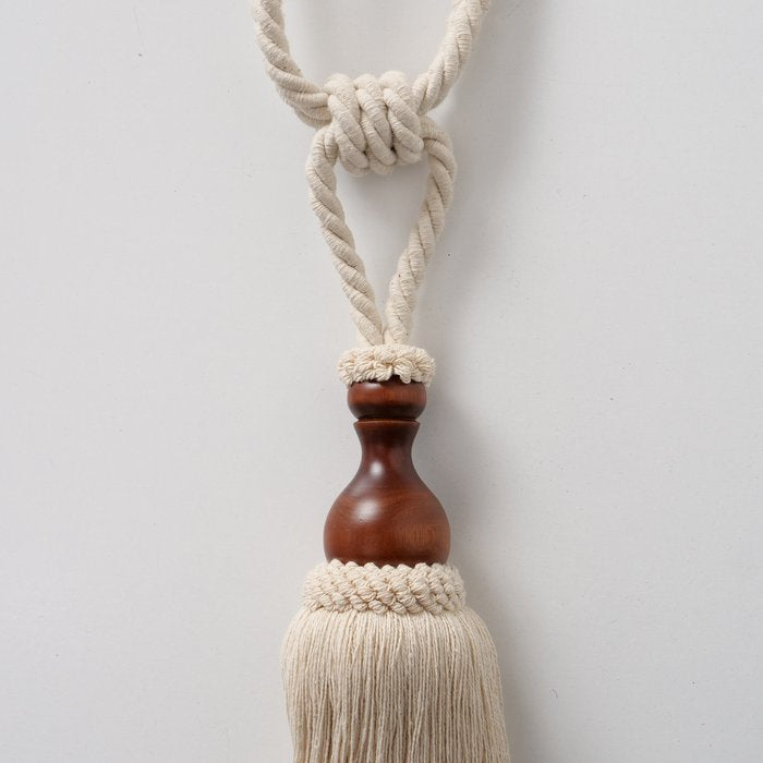 Pompon embrassé pour rideaux