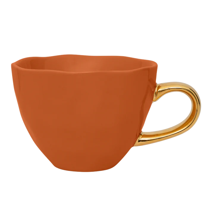 Tasse à thé anse doré