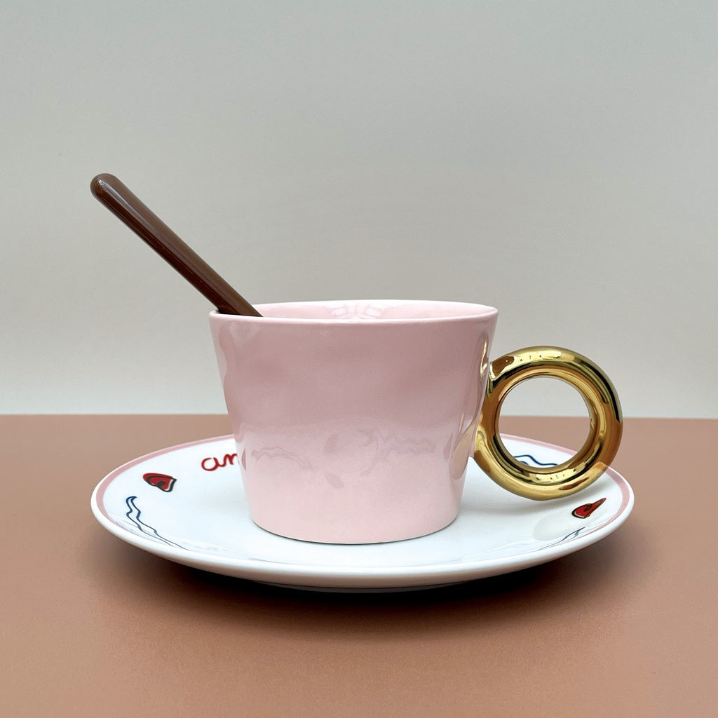 Tasse à café/thé anse dorée ronde