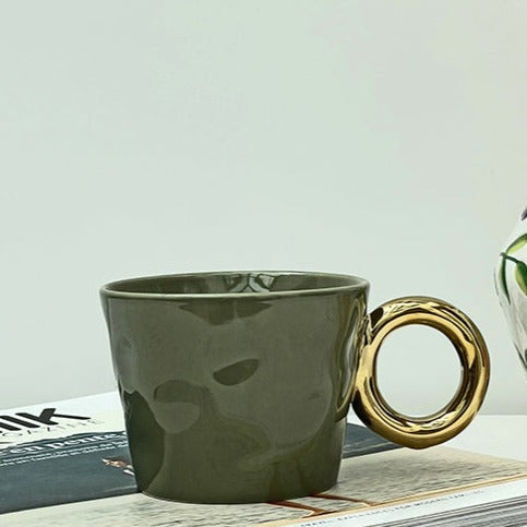Tasse à café/thé anse dorée ronde