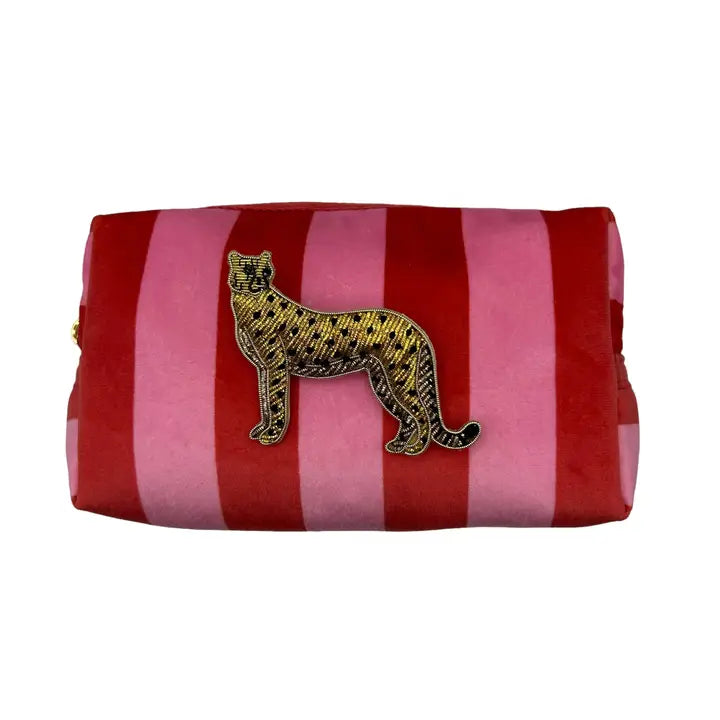 Trousse de maquillage rayée et broche